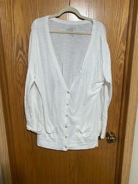 Really cute plunging V-neck sweater oversized in my opinion